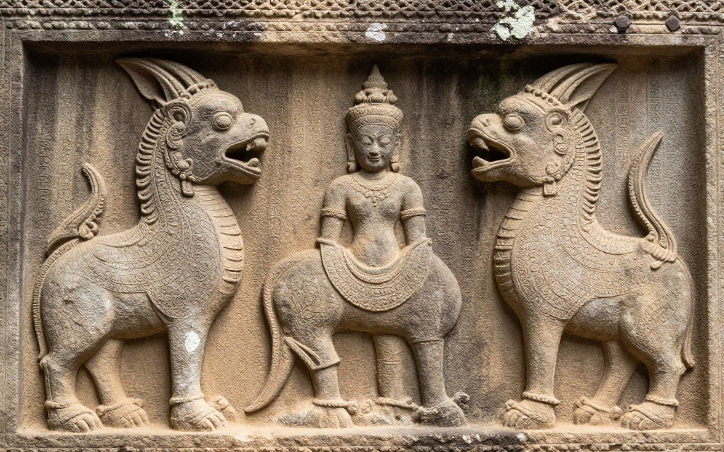 Cambodian temple relief with animal imagery Cambodian temple relief with animal imagery